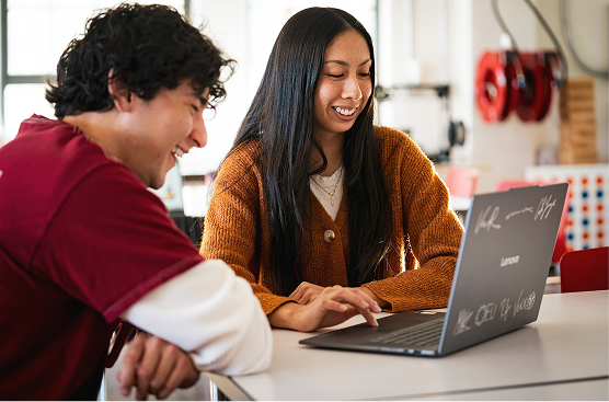 Students with a laptop